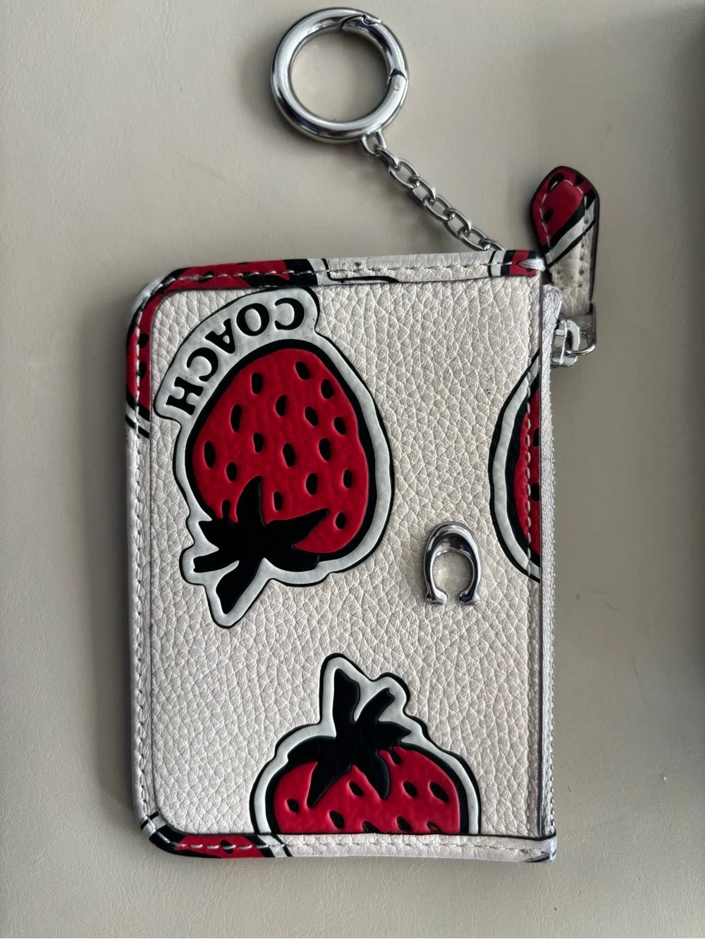 Coach Leather Pouch with Red Strawberry Keychain.